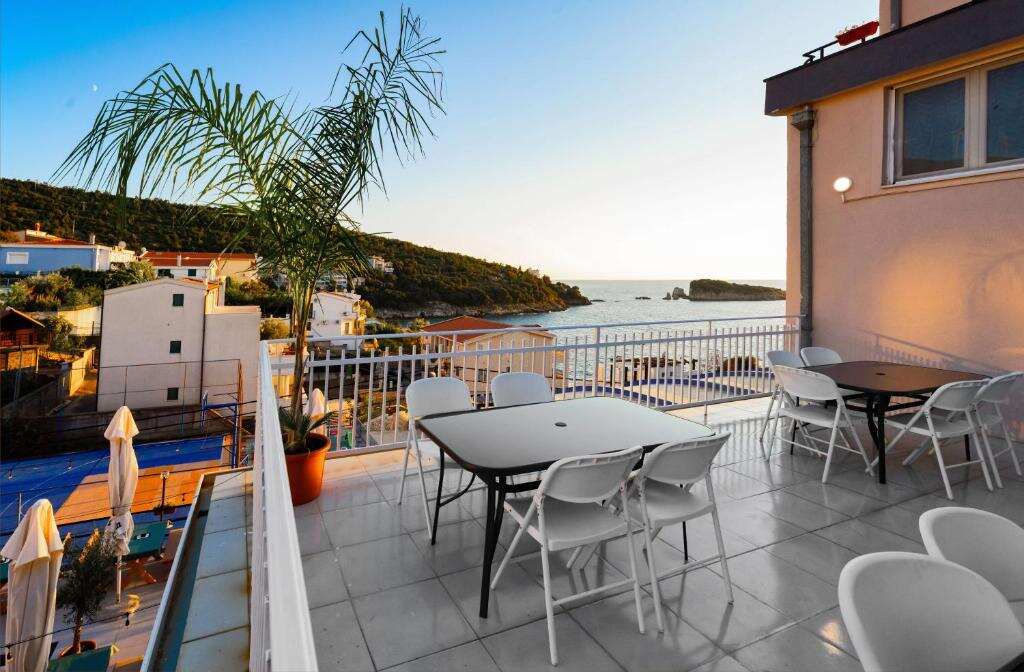 Sun terrace with sea views at El Mar Hotel